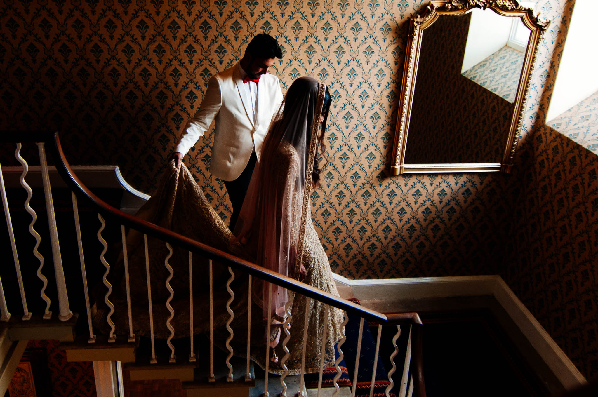 Bride and groom walking down stairs in Sheffield