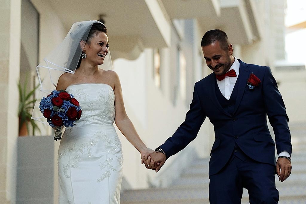 Smiling couple filmed bt a wedding videographer in Malta